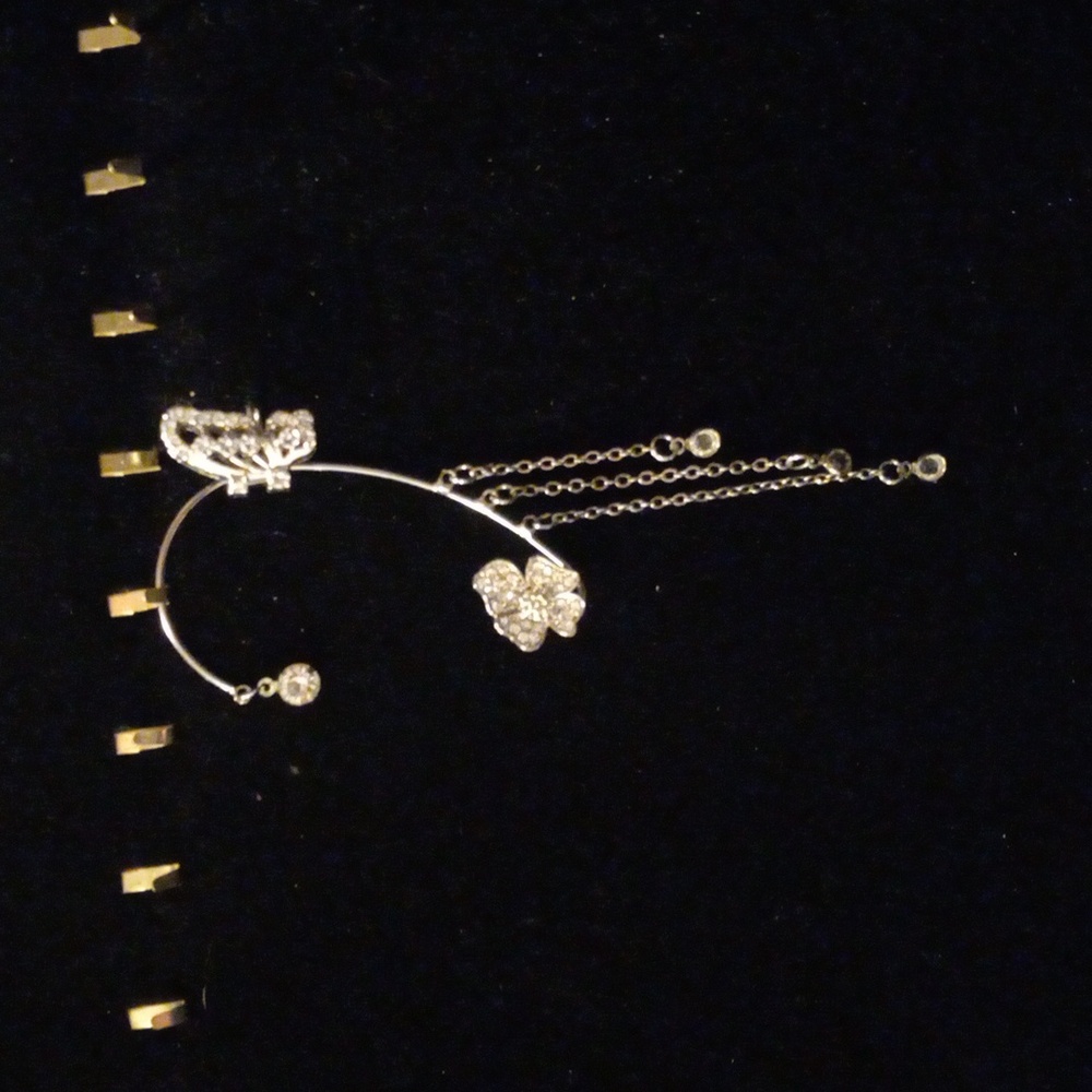 Butterfly ear cuff.